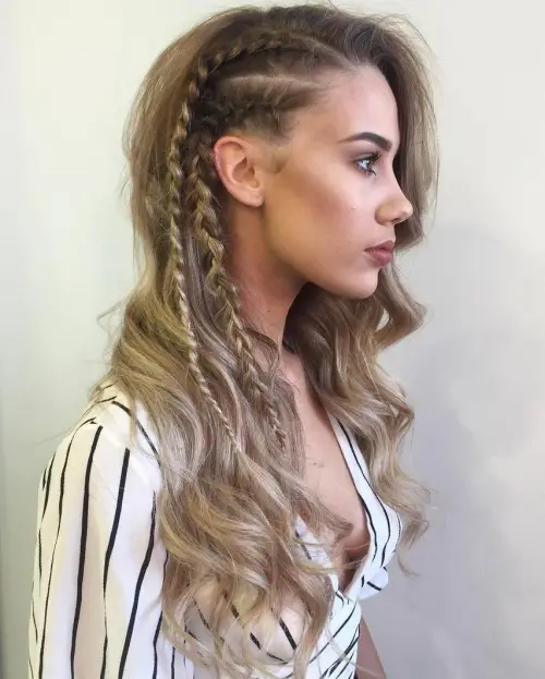 long wavy hairstyle with 2 braids