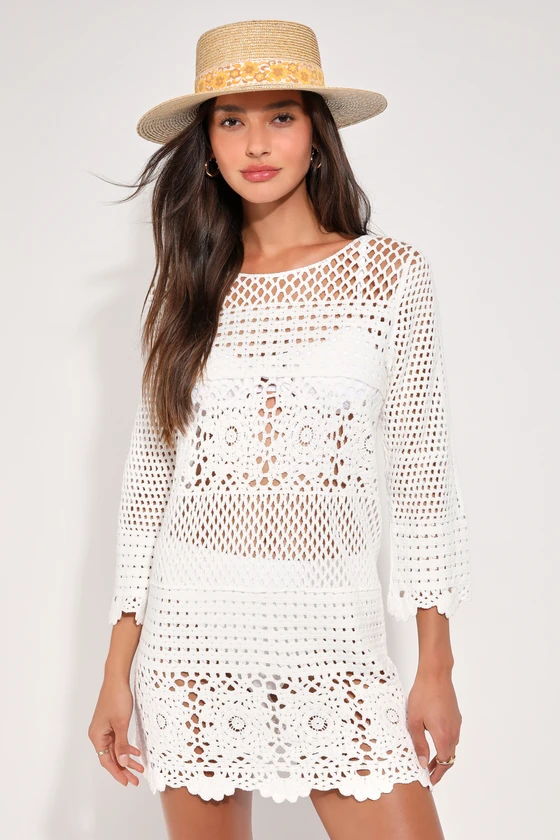 Classic Beach Outfit: White Crochet Cover-Up with Straw Hat