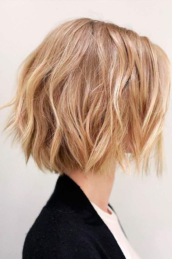  Classic shaggy bob hairstyle with soft layers for texture.