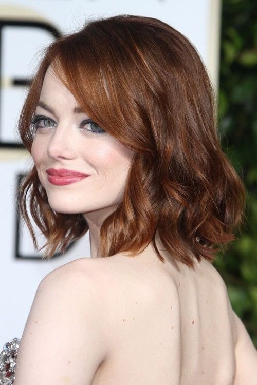 Emma Stone: Her wavy, layered bob adds a touch of glamour and is perfect for both casual and formal occasions.