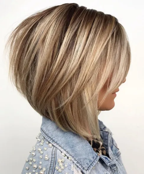 Layered bob haircut with different hair lengths for texture and movement.