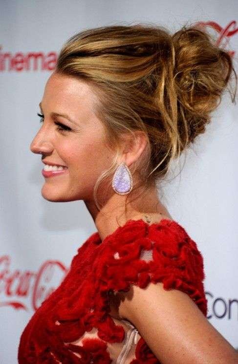 Blake Lively's Chic Messy Bun. Sophisticated and stylish, with added volume. Suitable for formal occasions. Blake Lively messy bun, chic messy bun, celebrity hairstyle, Blake Lively hair, elegant hairstyle