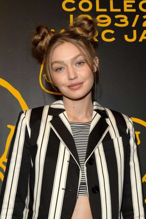 Gigi Hadid’s High Fashion Messy Bun. Gigi Hadid messy bun, high fashion messy bun, glamorous hairstyle, celebrity hair, Gigi Hadid hairstyle