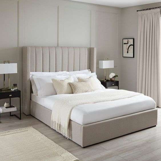 a fine bed. This image should emphasize the importance of quality bedding, featuring high-thread-count sheets, plush pillows, and a beautifully layered bed that looks inviting and comfortable.