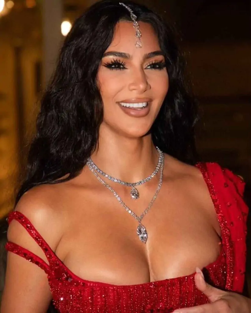 Kim Kardashian in a stunning red traditional Indian outfit at the Ambani wedding.