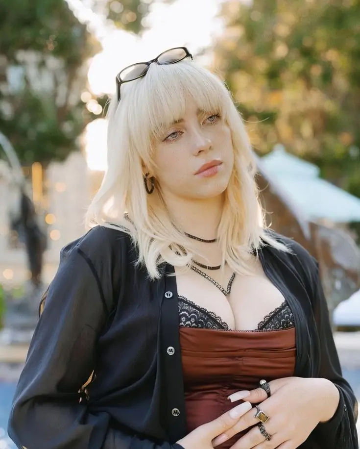 Billie Eilish is a young sensation who has taken the world by storm with her distinctive voice and style. Her music resonates with a generation, making her one of the most influential young artists today.