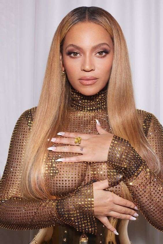 Beyoncé, known as "Queen Bey," has dominated the music industry with her powerful vocals and dynamic stage presence. An American singer, songwriter, and businesswoman, she is a prominent cultural figure of the 21st century.