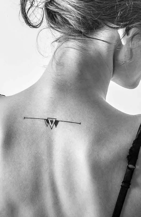 Geometric shapes like triangles, circles, or squares make for striking minimalist tattoos. They are clean, sharp, and can symbolize balance, harmony, and stability.