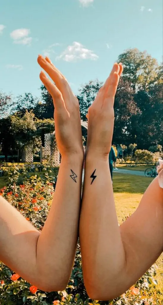 A small lightning bolt tattoo is a striking design that symbolizes power, energy, and inspiration. It's a great choice for those who want a bold yet minimalist look.minimalist lightning tattoo, small bolt tattoo ideas, simple lightning tattoos