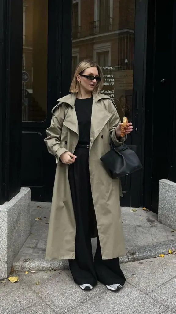 The maxi trench coat, typically reaching the calves or ankles, is all about making a bold, dramatic fashion statement. This long trench coat is perfect for those colder days when you need full coverage without sacrificing style.