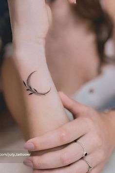 A crescent moon tattoo is a popular choice for those who love celestial designs. It symbolizes femininity, mystery, and change, making it a beautiful minimalist option. minimalist moon tattoo, small crescent moon tattoos, simple moon tattoo ideas