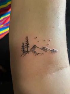minimalist mountain tattoo, small mountain designs, simple nature tattoos