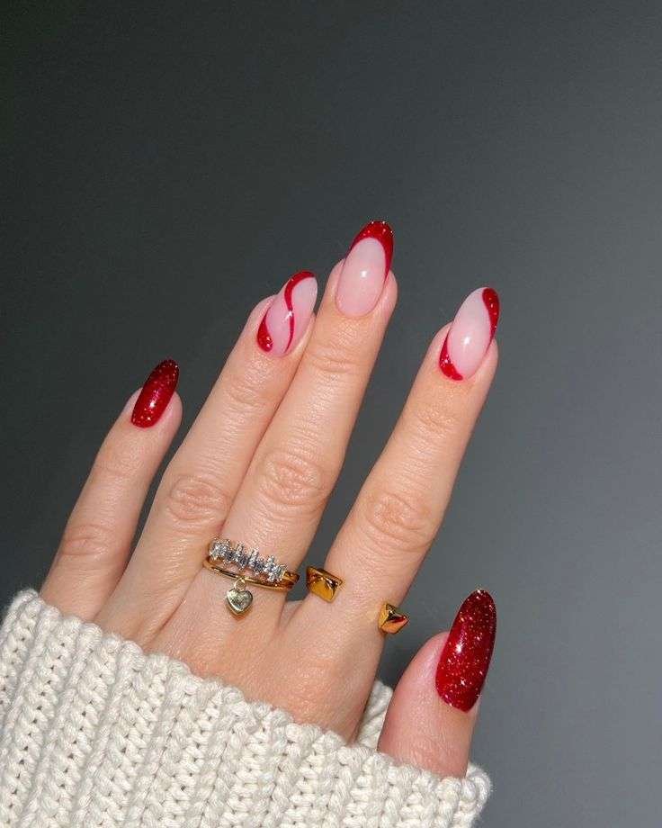 Some nails are coated in a rich, shimmering ruby red, like luxurious velvet or polished gemstones. This manicure is a study in festive elegance, reminiscent of delicately wrapped holiday presents. Picture smooth, glossy ribbons gracefully adorning a gift box.