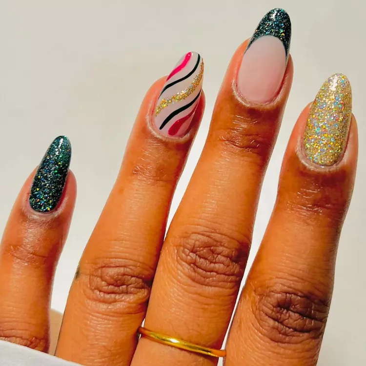 A classic French manicure with a teal glitter tip adds a touch of elegance to the overall festive and vibrant design. This look is all about embracing the joy and excitement of the holiday season. This manicure is a celebration of sparkle and festive fun. Imagine a burst of confetti at a holiday party.