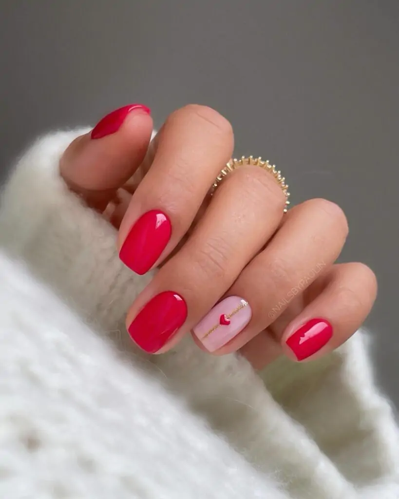 These nails are so chic! The bright red is perfect for Valentine's Day, and that delicate gold heart chain is the perfect touch of glam. I love how it's simple yet so elegant. I'd definitely get compliments on these!