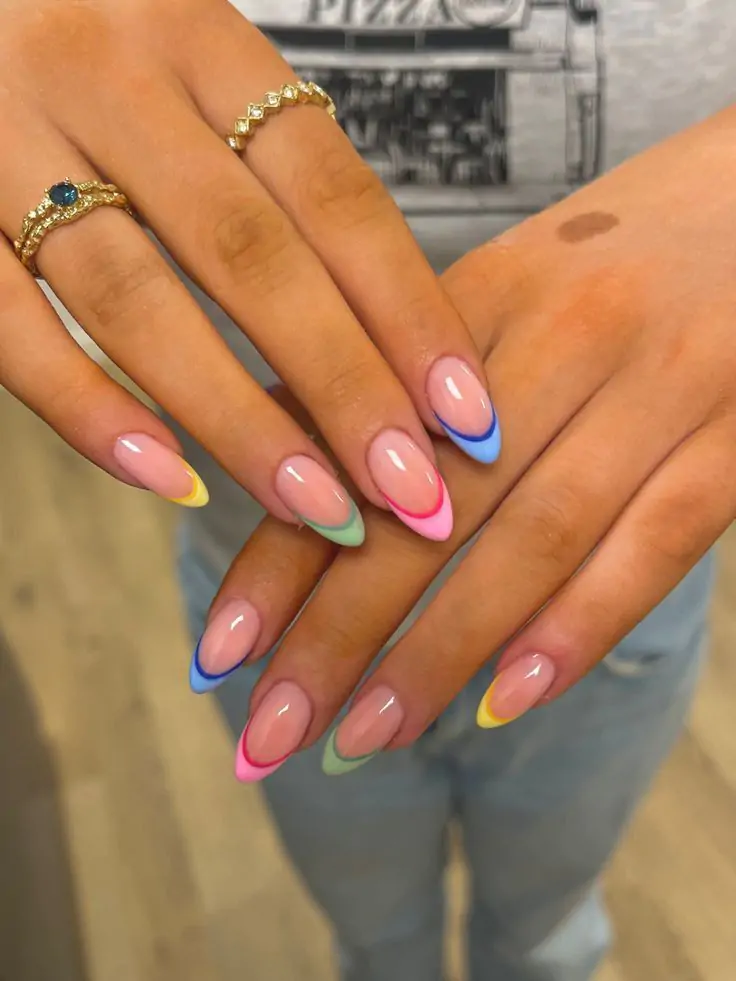 Can’t wait for you to rock this fun mani at your next spring outing. Obsessed with these vibrant rainbow-tipped nails—you’ll feel so playful and bold with this colorful look!