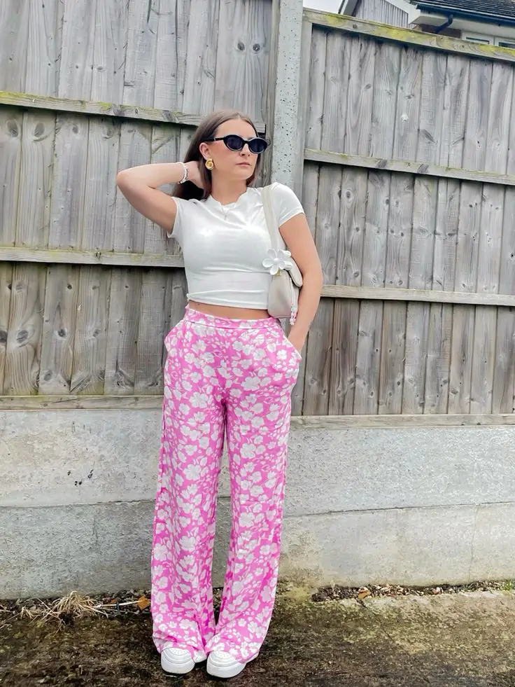 Pair floral printed pants with a fitted white blouse tucked in and pointed-toe heels for a bold spring look. Why It Works: A fun twist on the classic floral dress, floral pants are unexpected yet totally on-trend this season. They add a fresh pop of color and pattern to your spring wardrobe.