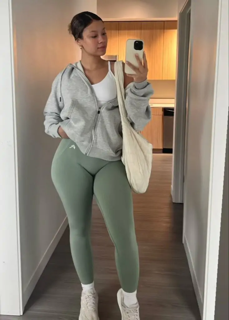 A pair of high-waisted leggings with a cropped hoodie and stylish sneakers. Add a cap or crossbody bag to complete the sporty chic vibe. Why It Works: Athleisure is still going strong, and it’s perfect for relaxed spring days. Whether you're heading to the gym or running errands, this look offers both comfort and style.
