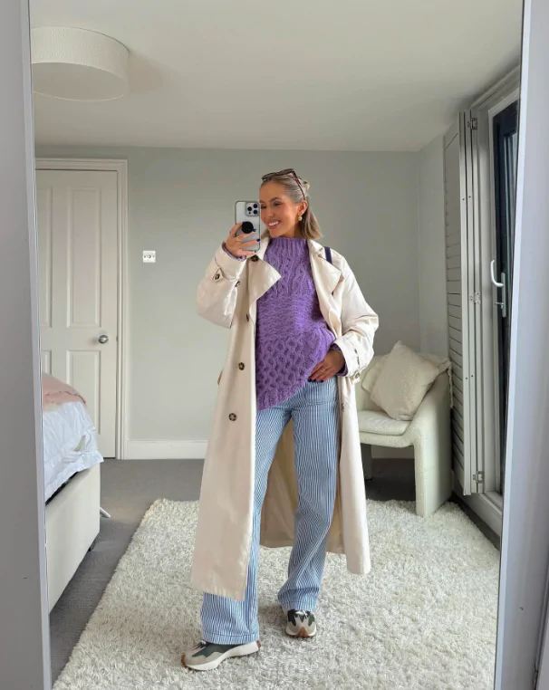 A chunky knit sweater paired with tailored cropped pants and ankle boots. Add a trench coat for a stylish layer. Why It Works: Spring can still bring chilly days, so layering is key. This outfit is perfect for cooler mornings or evenings and can be easily transitioned as the day warms up.