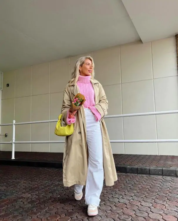 A chunky knit sweater paired with tailored cropped pants and ankle boots. Add a trench coat for a stylish layer. Why It Works: Spring can still bring chilly days, so layering is key. This outfit is perfect for cooler mornings or evenings and can be easily transitioned as the day warms up.