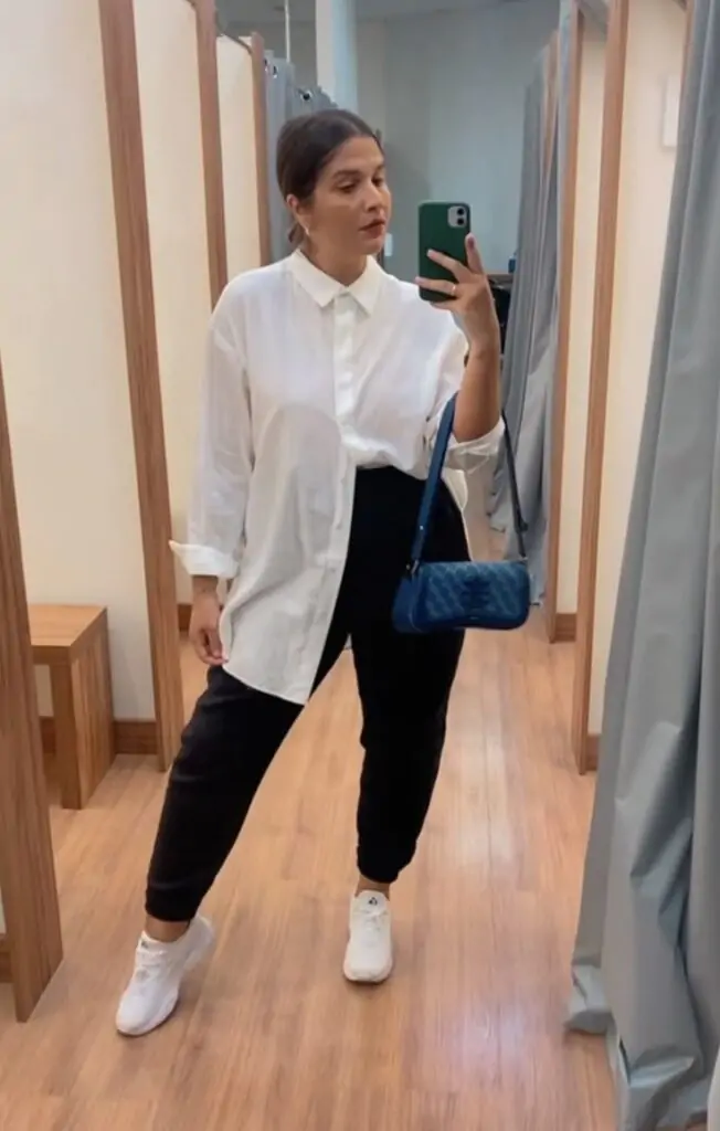 Figuring out how to wear oversized shirts can be a tall order. From button-downs to graphic tees, here are 15 stylish oversized shirt outfit ideas.