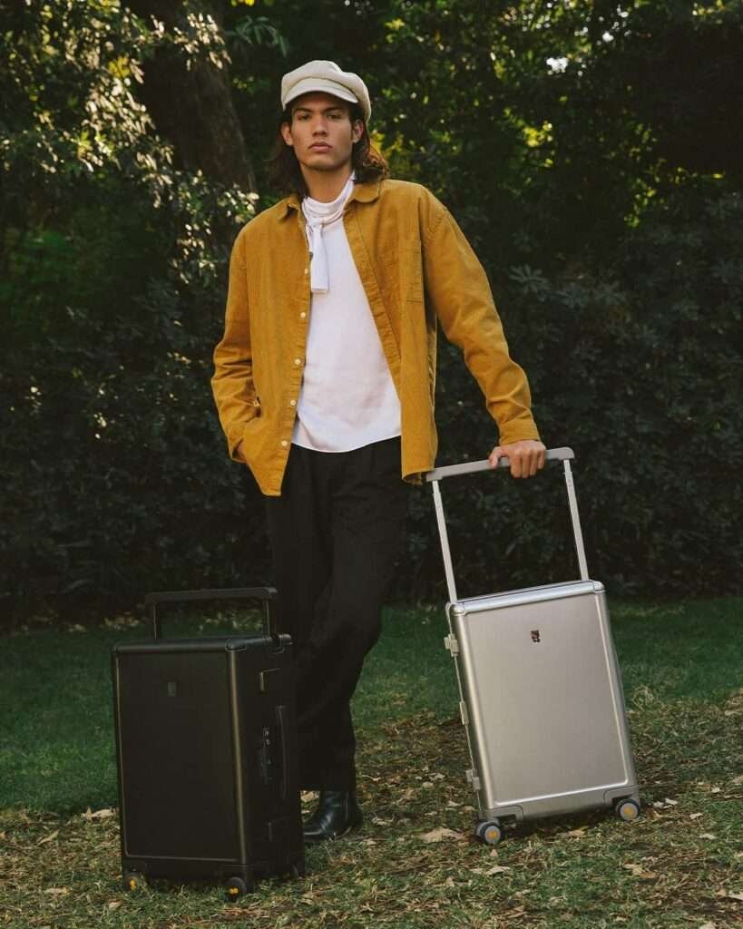 Crafted from aerospace-grade aluminum-magnesium alloy, this suitcase offers a sleek, glossy finish with crash-proof metal corner guards and an anti-wear stand for enhanced durability. Its zipperless design and TSA-approved locks provide secure and efficient travel, while the ultra-quiet 360° spinner wheels ensure smooth maneuverability.