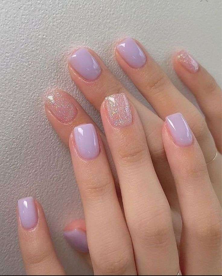 Bring the party to your fingertips. Confetti nails scatter multicolor glitter or tiny decals over a neutral or sheer base. Choi explains this look as “a fun, carefree style that instantly feels celebratory”.