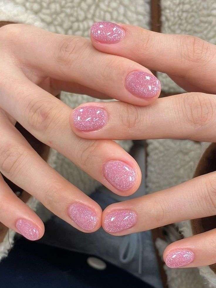 Bring the party to your fingertips. Confetti nails scatter multicolor glitter or tiny decals over a neutral or sheer base. Choi explains this look as “a fun, carefree style that instantly feels celebratory”.