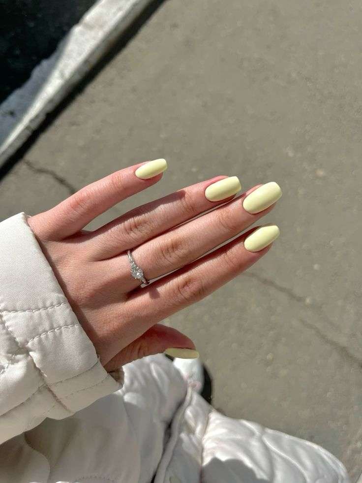 Channel sunshine with lemon-gel yellow nails. Bright lemon, tangerine, and lime are in – Marie Claire notes that citrus yellow is “fashion-forward” and instantly happy. This hue works as a full mani or as accents (like fruit nail art).