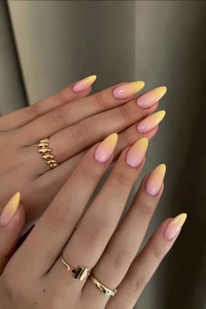 Channel sunshine with lemon-gel yellow nails. Bright lemon, tangerine, and lime are in – Marie Claire notes that citrus yellow is “fashion-forward” and instantly happy. This hue works as a full mani or as accents (like fruit nail art).