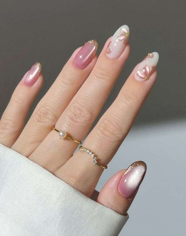 No matter the season, painting your nails pink is never a bad idea. This summer, Gerstein suggests ditching the classic color and using pearlescent pink polish instead. "This is replicating a shiny nail," she explains. "It’s like a micro shimmer, or it can have flecks of gold or silver." The glimmer effect adds a subtle pop to your manicure while still being minimalist.