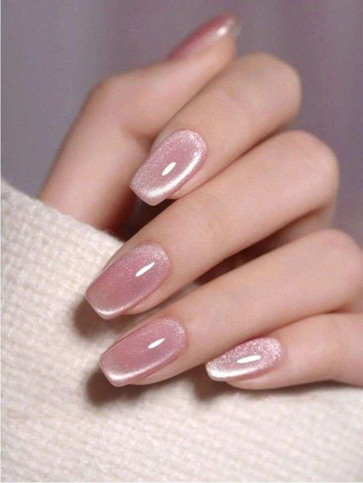 No matter the season, painting your nails pink is never a bad idea. This summer, Gerstein suggests ditching the classic color and using pearlescent pink polish instead. "This is replicating a shiny nail," she explains. "It’s like a micro shimmer, or it can have flecks of gold or silver." The glimmer effect adds a subtle pop to your manicure while still being minimalist.