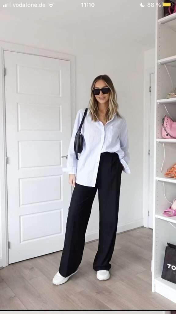 A minimalist’s dream outfit that works for class or coffee dates. The crisp white shirt adds structure, while slim pants elongate your frame. Add a leather watch for subtle elegance.