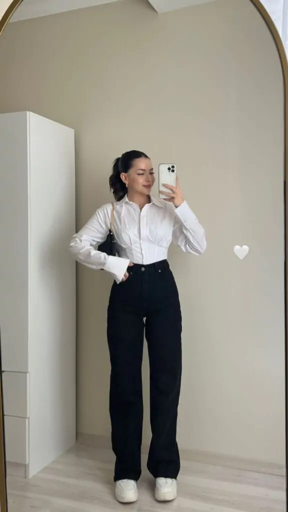 A minimalist’s dream outfit that works for class or coffee dates. The crisp white shirt adds structure, while slim pants elongate your frame. Add a leather watch for subtle elegance.