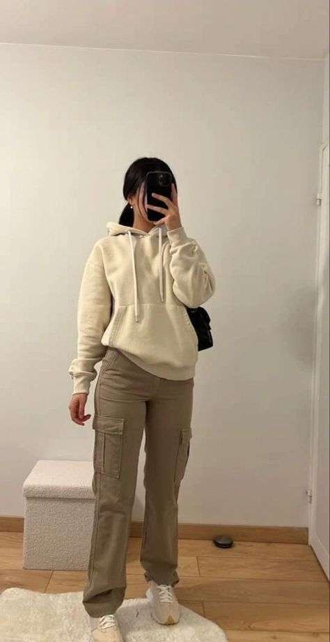 Functional yet fashion-forward, this pairing works for long study days. Cargo pants offer extra storage for essentials. Top it off with a baseball cap for a sporty edge.