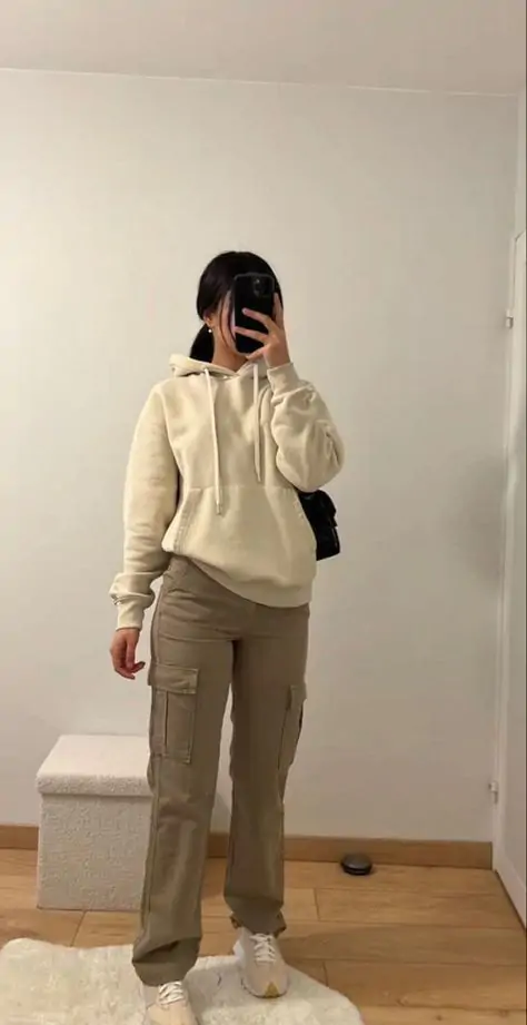 Functional yet fashion-forward, this pairing works for long study days. Cargo pants offer extra storage for essentials. Top it off with a baseball cap for a sporty edge.