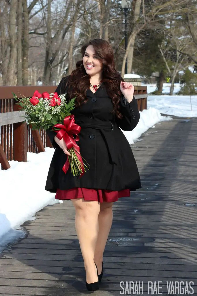 Plus size black Valentine’s Day outfit with chic accessories