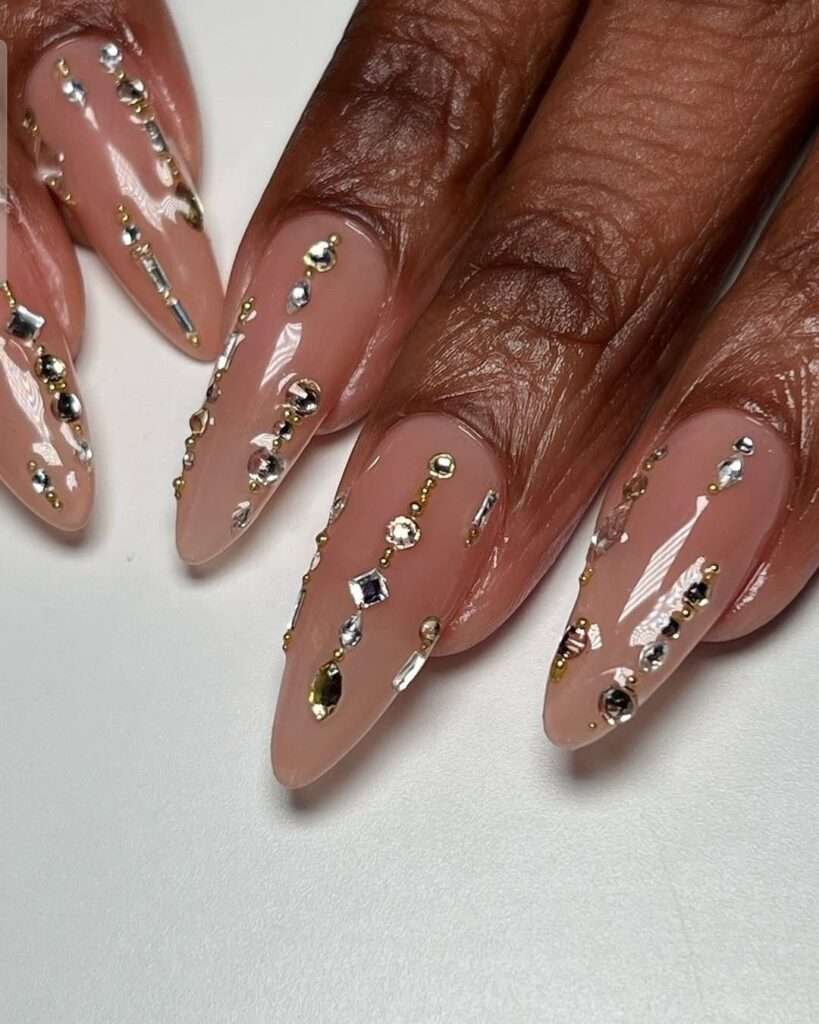 This vibrant and playful look is most commonly referred to as Mismatched Pink and White Polka Dot nails. In the 2026 nail scene, this specific aesthetic—featuring a "Skittle" palette of different pinks—is also a major part of the "Barbiecore" or "Coquette" nail trends, which emphasize hyper-feminine, vintage-inspired details.