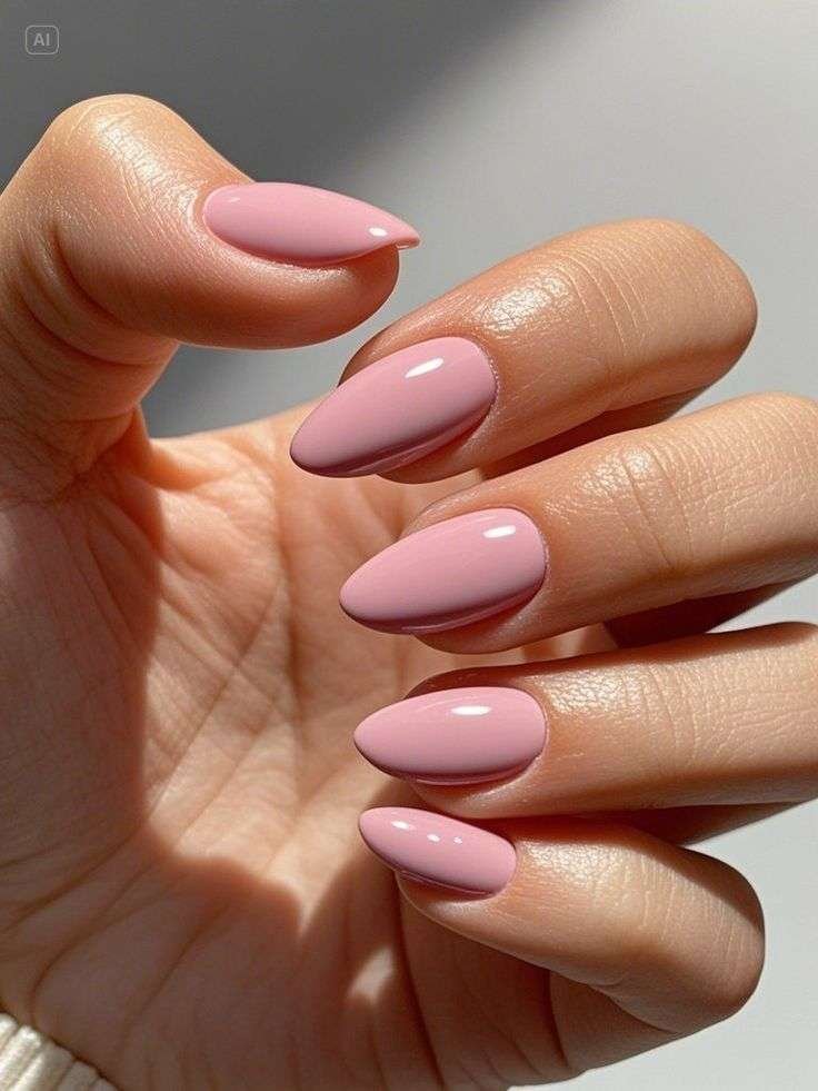 This sophisticated look is widely known as a Peach French Tip Manicure on an Almond shape. In 2026, this specific minimalist style is often called "American French" or "Vanilla Nails" when the contrast between the base and tip is soft and natural rather than stark white.