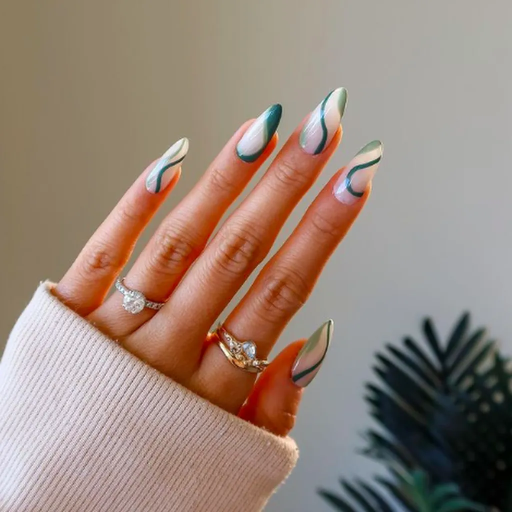 Abstract swirl nail art is a versatile and evergreen trend that emphasizes fluid, organic lines and playful color layering. For 2026, the trend has evolved into "soft maximalism," combining retro 90s-inspired curves with modern finishes like chrome accents and cat-eye magnetic effects.
