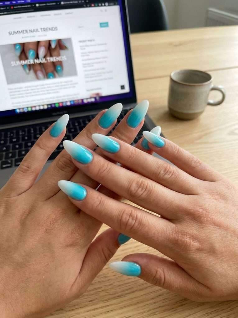 Aqua-to-white ombré nails—often called "ocean wave" or "baby boomer" blue nails—are a refreshing, serene look that mimics the gradient of tropical shorelines. This style transitions from a saturated aqua or turquoise at the base or tip into a crisp, milky white.