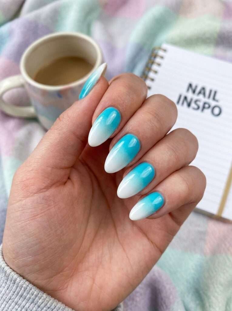 Aqua-to-white ombré nails—often called "ocean wave" or "baby boomer" blue nails—are a refreshing, serene look that mimics the gradient of tropical shorelines. This style transitions from a saturated aqua or turquoise at the base or tip into a crisp, milky white.