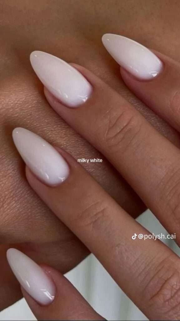 Milky white nails are the ultimate "clean girl" staple for 2026, offering a soft, semi-translucent finish that sits perfectly between a sheer nude and an opaque white. Unlike a stark "white-out" look, this style has a cloudy, blurred effect that mimics the appearance of skim milk or white jade [1, 5]