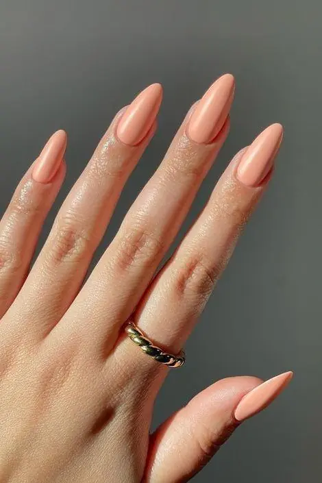 Peach fuzz pastel nails are a soft, "velvety" manicure trend inspired by Pantone’s 2024 Color of the Year, which remains a top-tier choice for 2026's "quiet luxury" and neutral palettes. This shade sits between a delicate pink and a warm orange, offering a modern, airy glow that suits every skin tone.