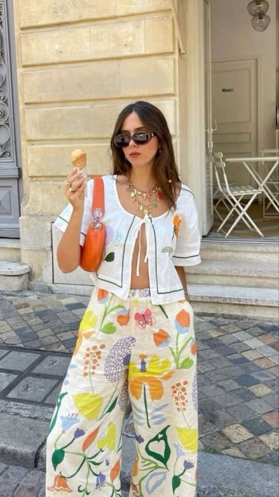 Permission granted: you can wear stripes with florals, polka dots with animal print, and plaids with abstract geometrics. Summer 2026 is officially the season of print clashing — and designers like Khaite, Miu Miu, and Chanel have been leading this charge with genius combinations that shouldn't work on paper but look incredible in real life.