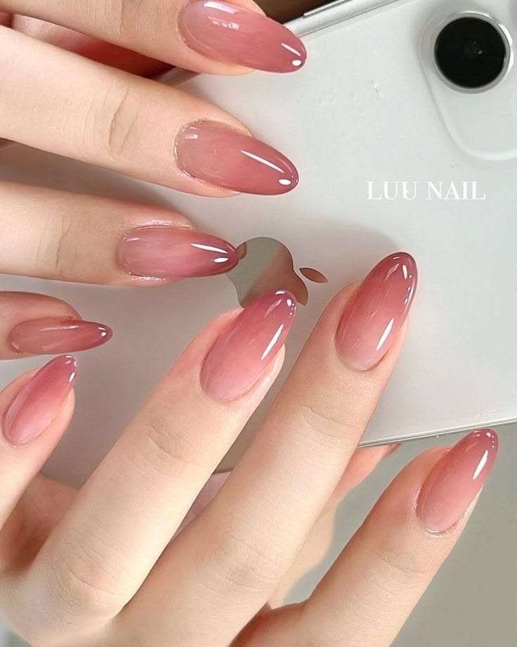 Sheer jelly nails—also known as "syrup nails" or "glass nails"—are a high-shine manicure trend characterized by their translucent, candy-like finish. Inspired by 90s nostalgia and the recent rise of Korean beauty trends, this look uses tinted, semi-transparent polishes that allow your natural nail tip to peek through, creating a "juicy" or watery effect.