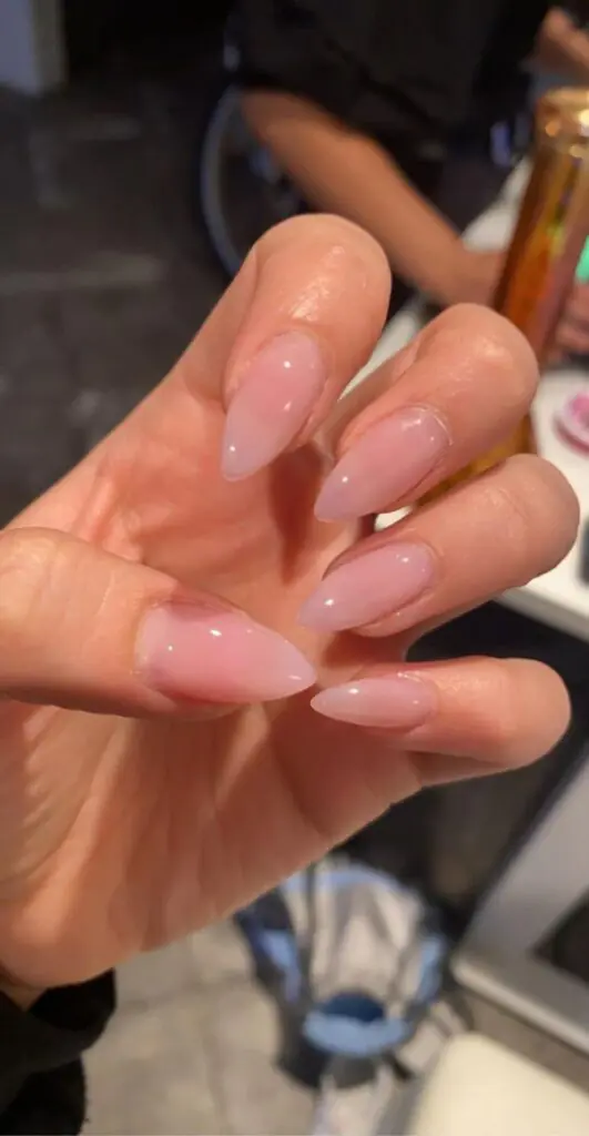 Sheer jelly nails—also known as "syrup nails" or "glass nails"—are a high-shine manicure trend characterized by their translucent, candy-like finish. Inspired by 90s nostalgia and the recent rise of Korean beauty trends, this look uses tinted, semi-transparent polishes that allow your natural nail tip to peek through, creating a "juicy" or watery effect.