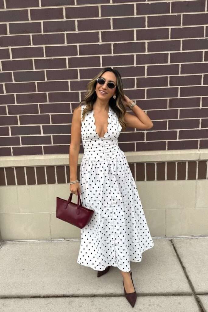 Polka dots have always had a reputation — a little twee, a little retro, the kind of print that feels charming on a 1950s housewife but awkward in 2026. And then Jacquemus happened. The key to wearing polka dots in Summer 2026 without looking like you raided your grandmother's closet? Scale and restraint. One dotted piece, styled against something architectural or structured. A polka-dot slip skirt with a fitted white tank and kitten mules. A dot-printed blouse worn open over a bikini top for the beach. That's the energy.