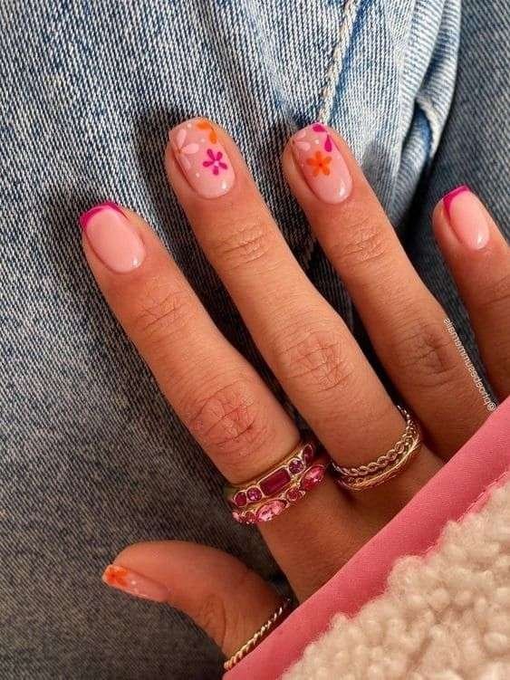 Tropical floral nail art is a vibrant manicure trend that captures the essence of a sun-soaked getaway using exotic motifs like hibiscus flowers, palm leaves, and monstera plants. This aesthetic often features neon or bright tropical colors that pop in direct sunlight, such as fuchsia, tangerine, and turquoise