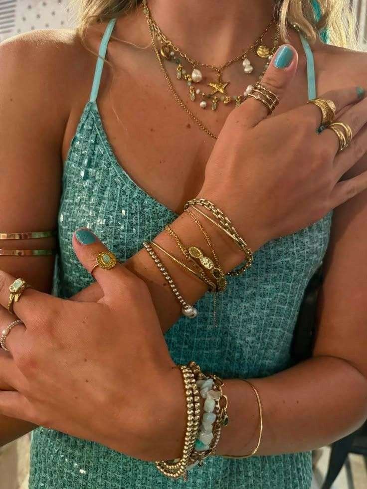bracelets heavy with charms